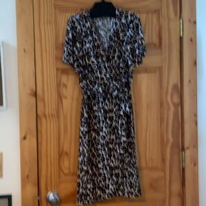 Leopard print dress, belted, wrap skirt.